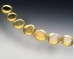 Transition bracelet with 18K discs and beachstones