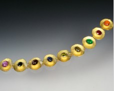 Disc bracelet with gemstones