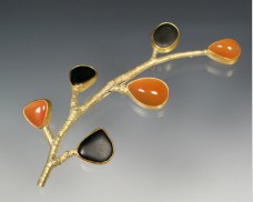 Crescent twig brooch