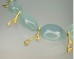 Aquamarine necklace with 18K twig spacers