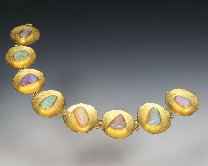 Disc bracelet with opals
