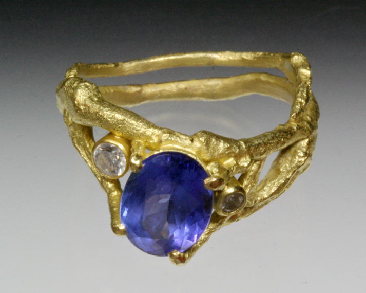 Twig ring with prong-set gemstone